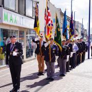 Eric Howden BEM leads the parade back from Redcar Town Clock after the ceremony