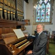 The church organ at All Saints, Kirby Hill, is 150 years old. Pictured is Peter Crawford, church organist