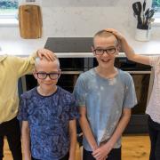Finlay and Rory with twin sisters Orla and Esme after the headshave