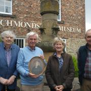 Richmond School old boy John Culpan, museum chairman Mike Wood, and Gillian and Richard Howell, who have donated the portrait to the Richmondshire Museum