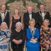 Front, Helen Ison, Joan Phillips, Baroness Harris of Richmond, president Emma Biggs, Cllr Amanda Eames, and Anne Myers. Back, president elect David Ison, district governor David Phillips, Judy Moorhouse, Dean Biggs, Mayor Phil Eames, and Danny Myers