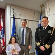 Layla Henderson collects her great-great-grandfather';s medal from Greek officials at the embassy to London just before Christmas