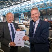 Cllr Carl Les, leader of North Yorkshire Council, and Richard Flinton, Chief Executive of North Yorkshire Council hold the draft devolution deal in August 2022