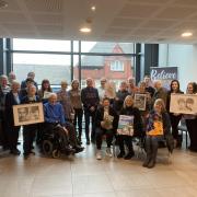 Members of Art of Survival gather for the first anniversary party at Darlington Hippodrome