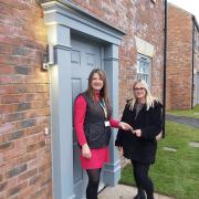 North Star Housing Officer Clare Ambrose handing over the keys to Lisa Thompson