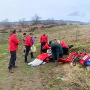 Mountain rescuers help the injured climber at Barkers Crag in Scugdale