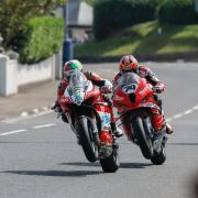 Davey Todd (74) battling with Glenn Irwin (1) at the North West 200