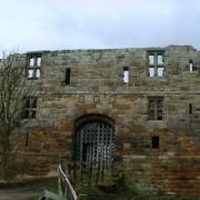 The magnificent gatehouse at Whorlton Castle which features four shields