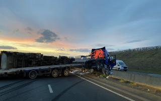 The low-loader lorry crashed through the central reservation of the A1(M) around 7.00 am this morning.
