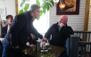 Sir Keir Starrmer speaking to Daniel Smith (right) in the Influence Cafe in Skinnergate, Darlington